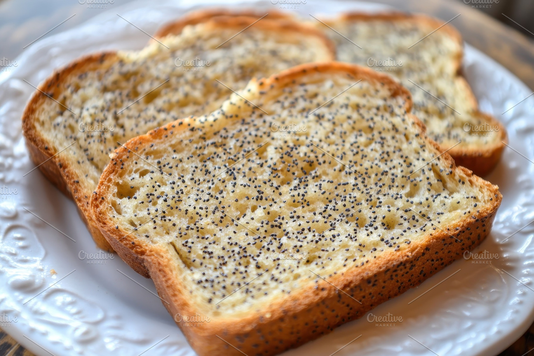 Toasted poppy seed bread slices, a Photo by Pavel_design