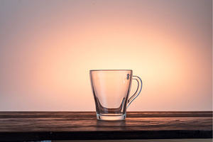 Empty transparent glass tea cup with, a Food & Drink Photo by Stockphoto by vzwer