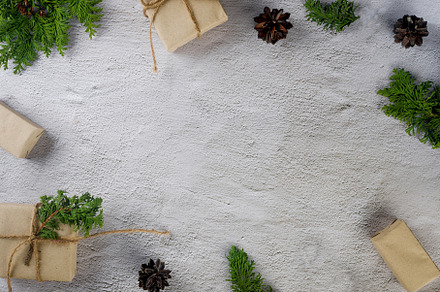 Christmas still life. Xmas Gift in craft paper with pine cones,, a Holiday Photo by vimart