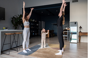 Two women in sportswear and a child, a Sports & Recreation Photo by undrey