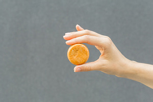 Woman hands holding organic soap