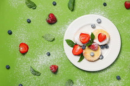 Concept of tasty sweet food, cheese pancakes, space for text, a Food & Drink Photo by AtlasStudio PRO