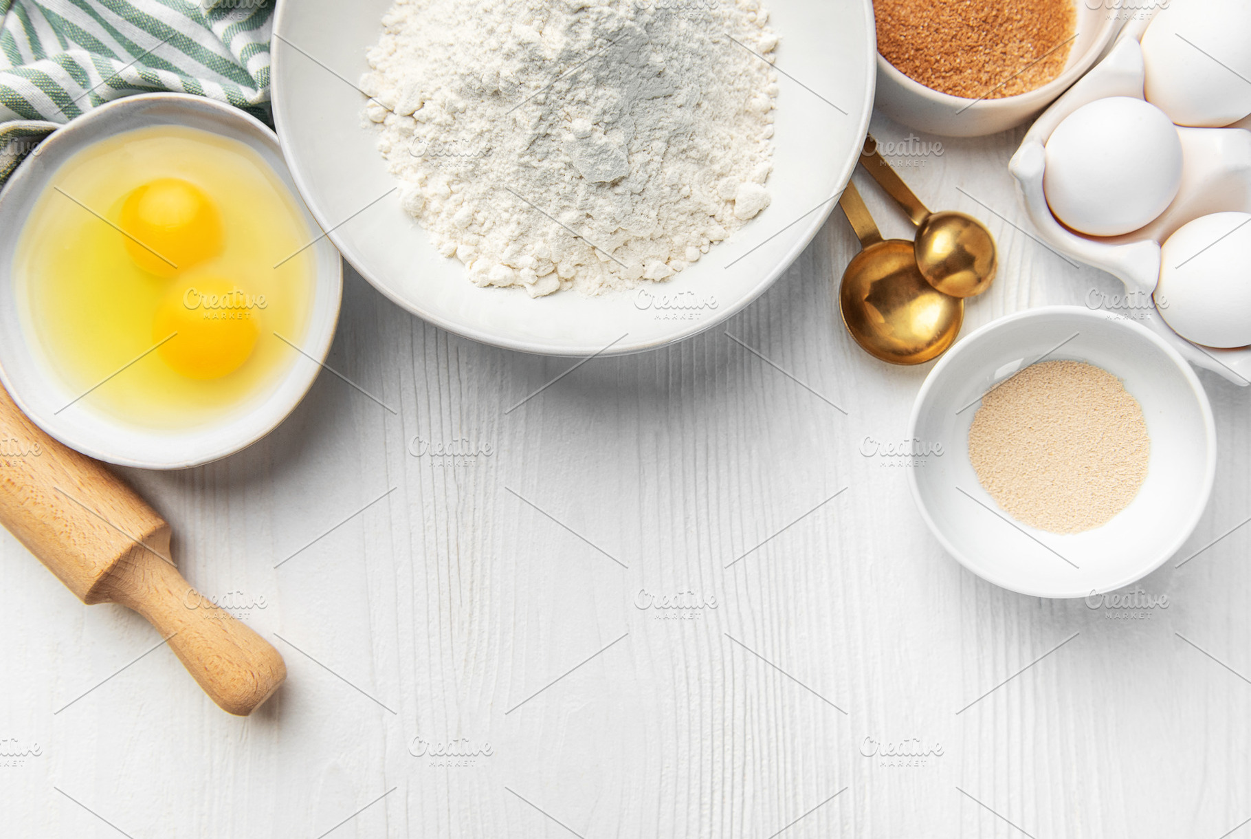 Baking ingredients on white wooden table for food preparation, a Food & Drink Photo by Olena Rudo