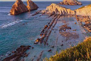 Blossoming Arnia Beach (Spain) Atlantic Ocean evening coastline, a Nature Photo by YuriyB