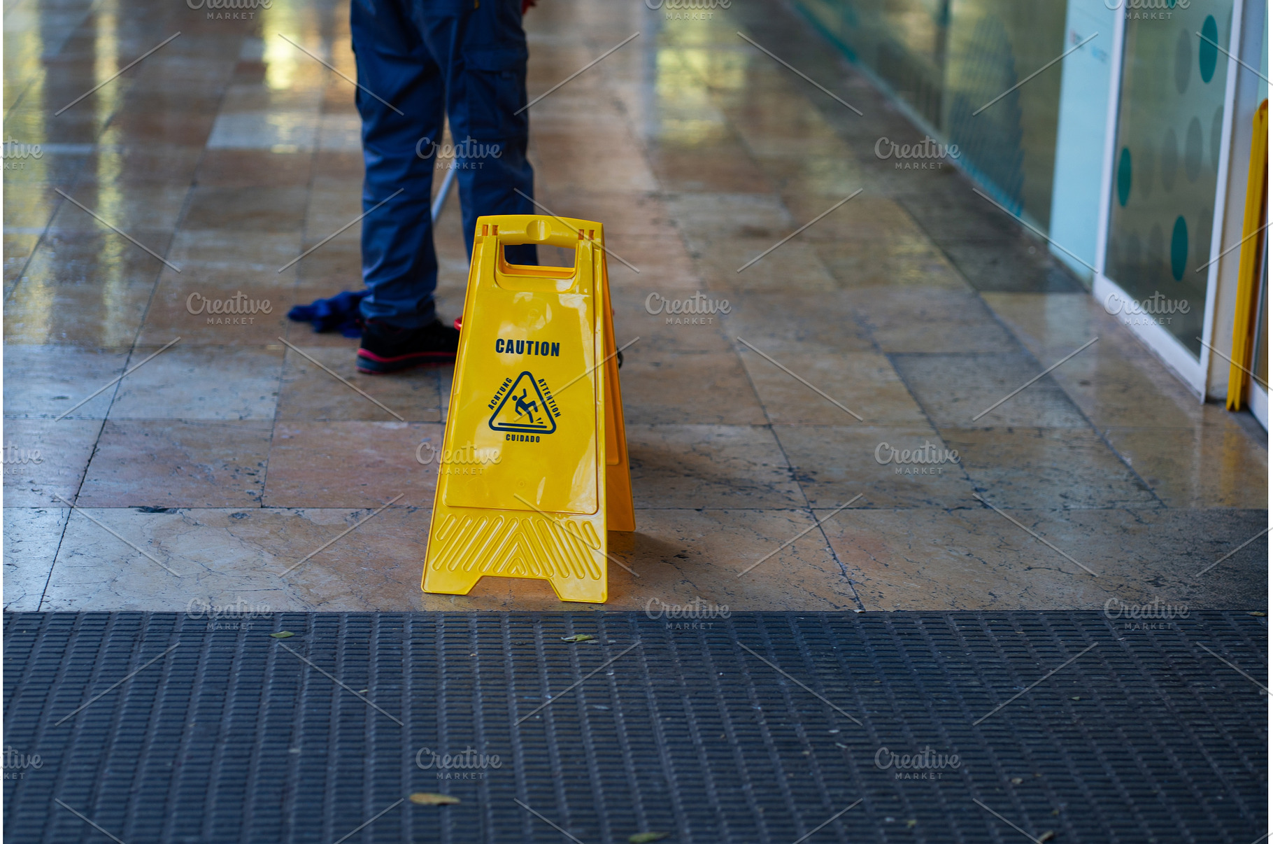 Yellow caution sign warning about a, an Industrial Photo by volodymyrshtun13795