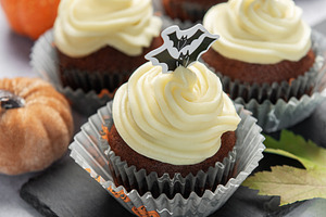 Halloween cupcakes with bat toppers and pumpkin decorations, a Food & Drink Photo by Olena Rudo