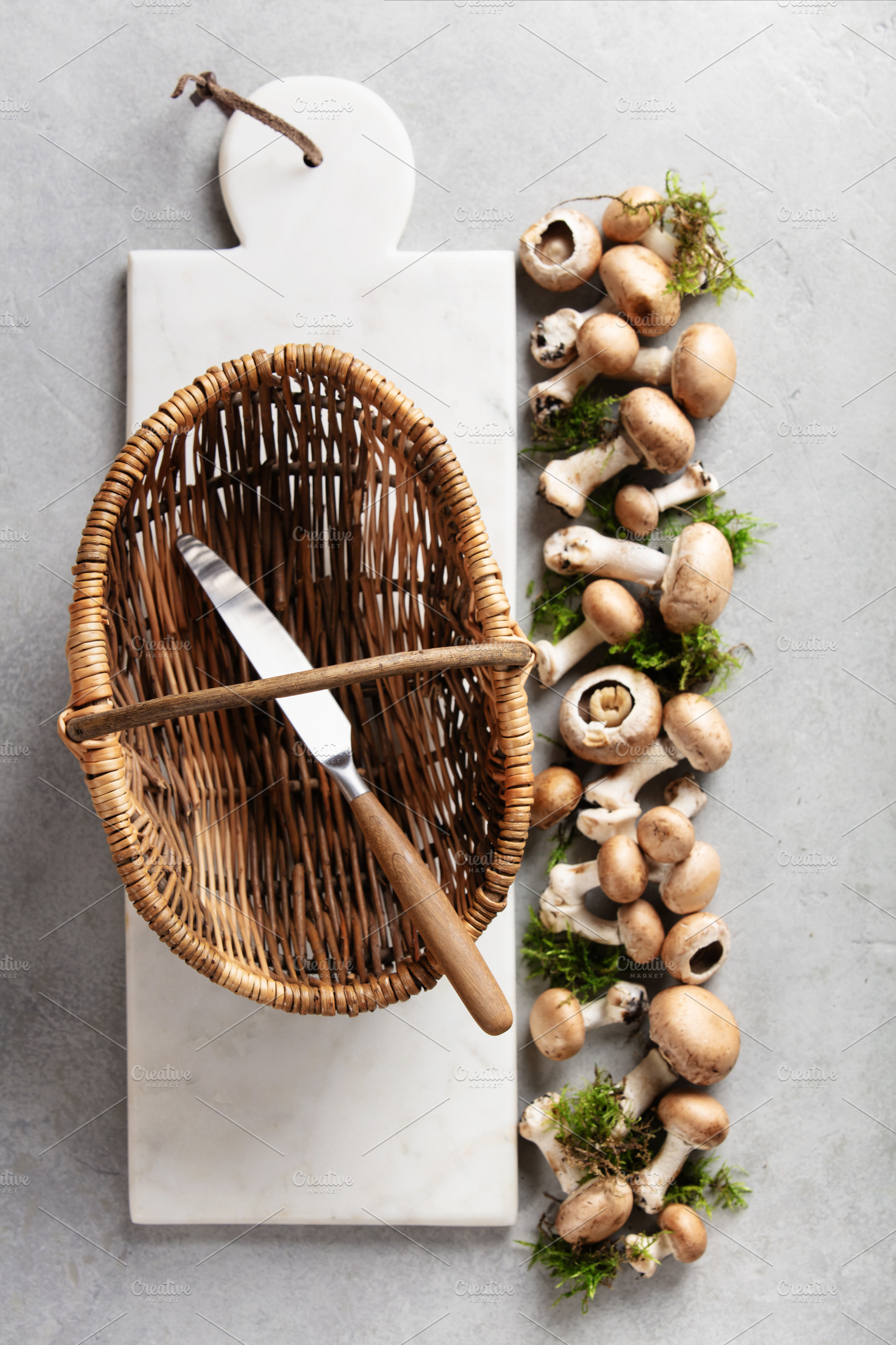 Wicker Basket and Fresh Mushrooms on Marble Cutting Board, a Food & Drink Photo by Natalia Klenova's Shop