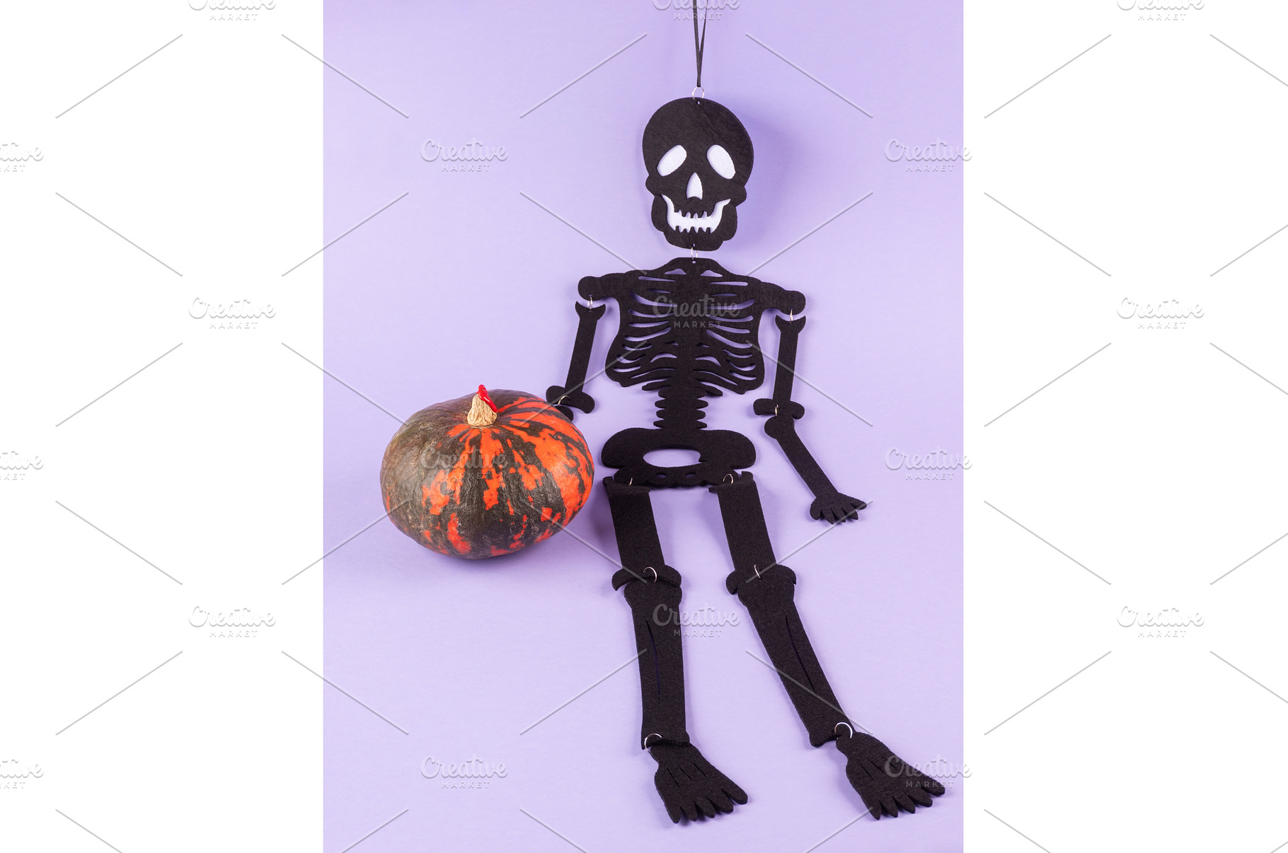 Black halloween skeleton with orange, a Holiday Photo by Lifemorning