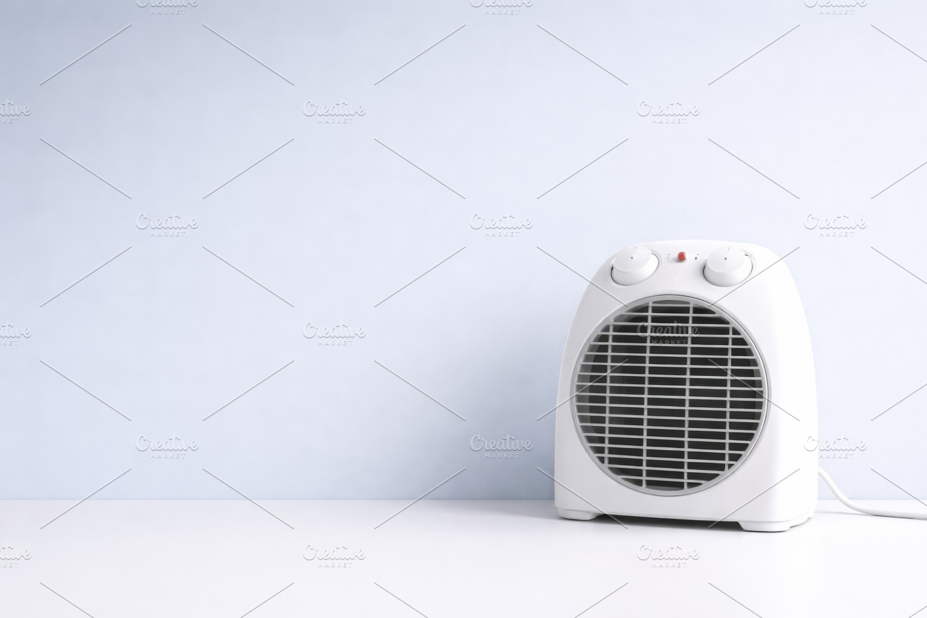 Electric heater on white table with, a Photo by Dvoevnore photos