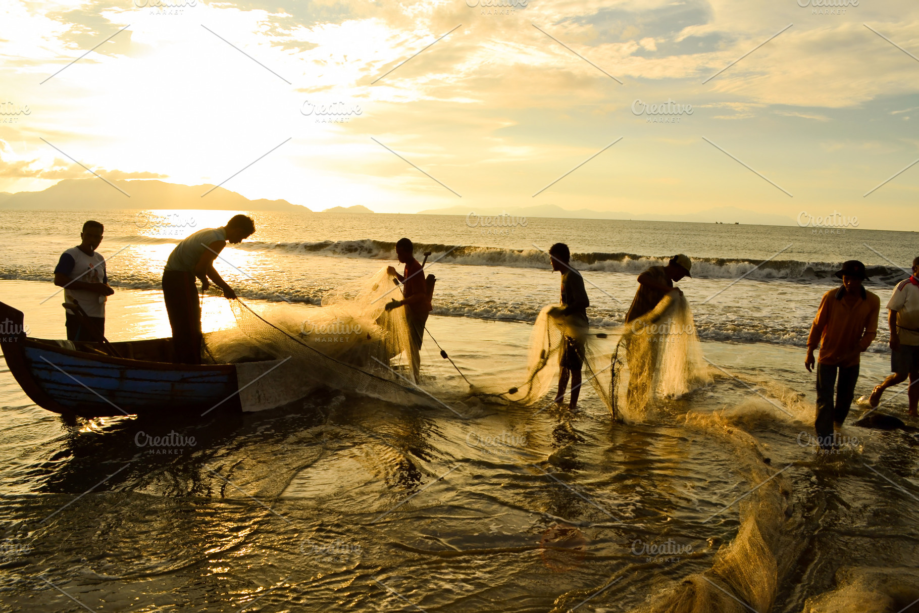 Fishermen Pulling Nets As the SunSet, a Person Photo by bastera