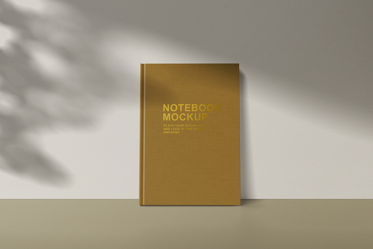 Notebook mockup, a Books & Magazine Mockup by graphiccrew (Photo 3 of 12)