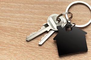 Keys with house shape keychain representing home ownership, a Business Photo by Olena Rudo