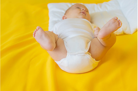 Baby feet on a yellow background, a Person Photo by yanadjana