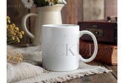 Styled Cup Mockup on Knitted Fabric, a Product Mockup by MockupWizard (Thumbnail 1 of 3)