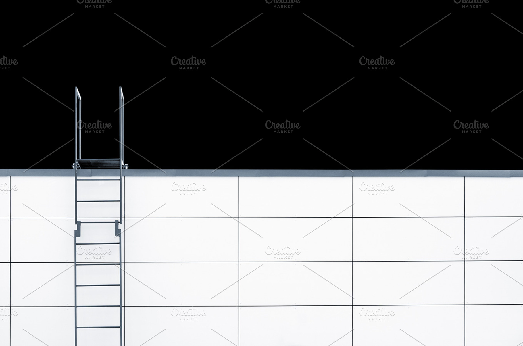 Metal emergency stairs on white wall, an Architecture Photo by BOOCYS