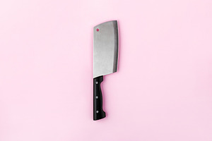 Stainless steel cleaver knife with black handle isolated on past, a Food & Drink Photo by Ales Munt