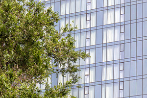 A view of the modern glass façade, an Architecture Photo by Schreibikus