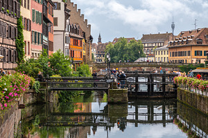 Canal bridge and colorful buildings in Strasbourg France, an Architecture Photo by GoodGoods