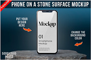 Phone Mockup on Stone Surface PSD, an iPhone Mockup by Bruno's Shop (Thumbnail 1 of 4)