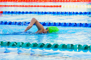 Swimmer child swims freestyle swimmi