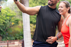 Fitness couple taking selfie together during outdoor workout in park, a Person Photo by etorres69