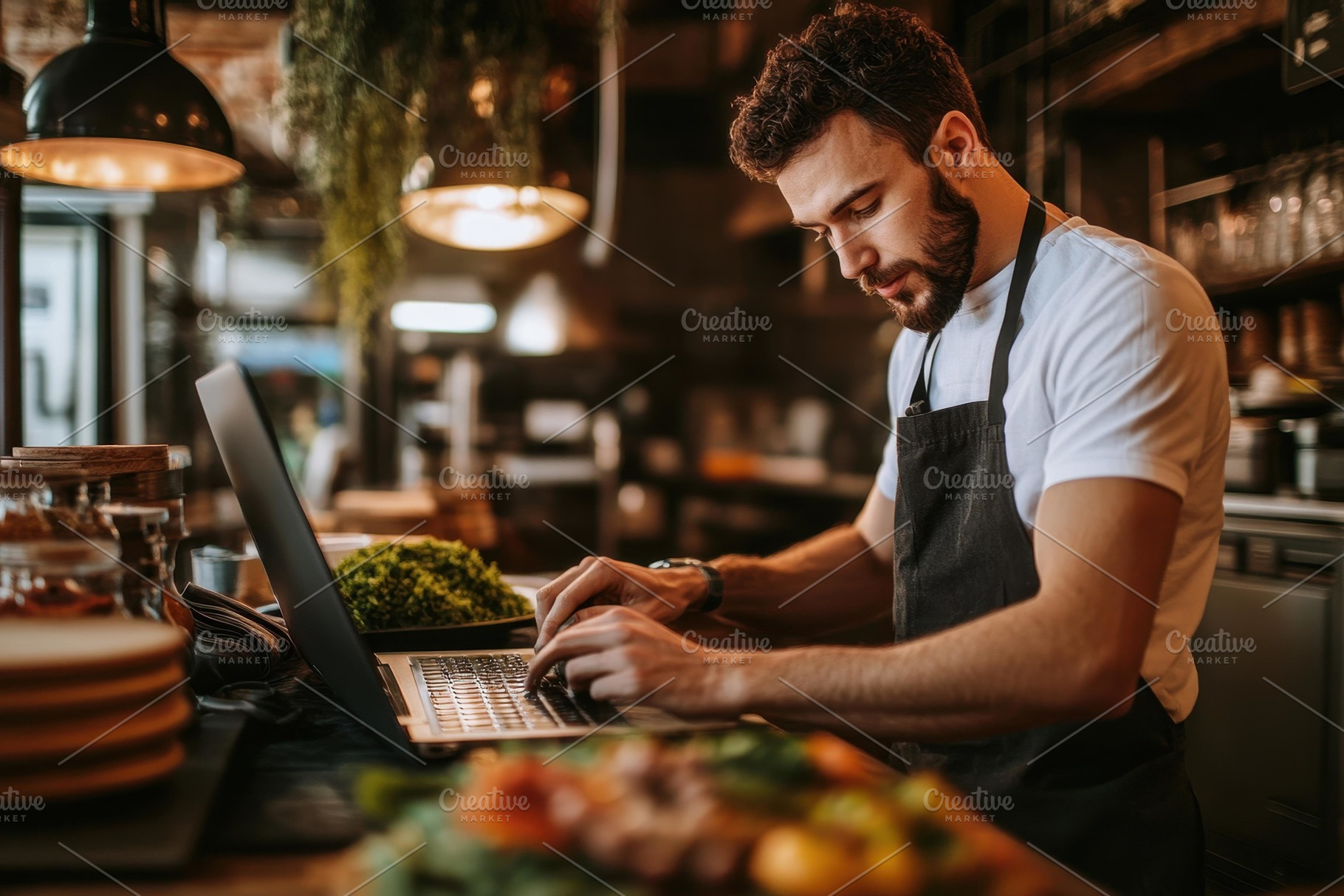 Chef working on a laptop in a cozy k, a Photo by Tanuart