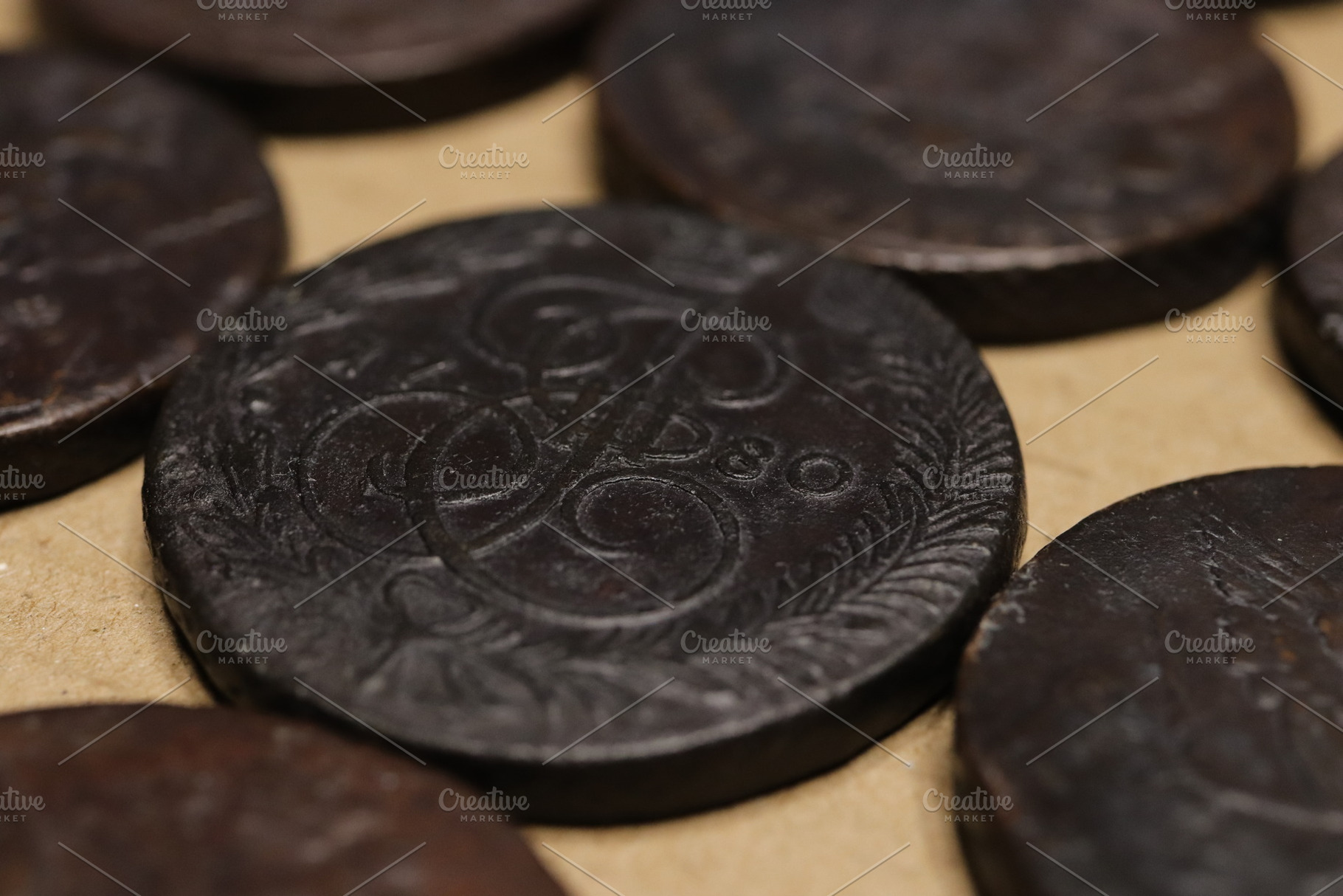 A close-up view of old Russian Empire 5 kopecks of Catherine II coins with intr, an Industrial Photo by Textures & Backgrounds