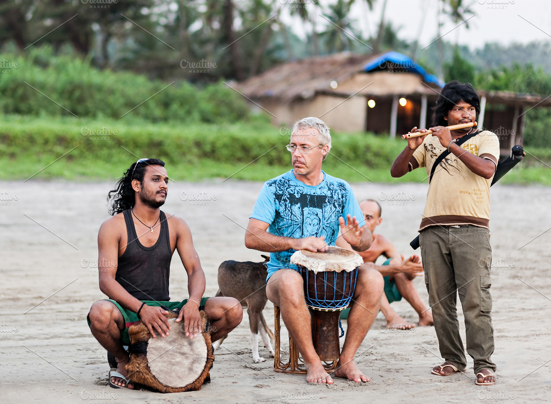 Hippies playing music, a Photo by saiko3p