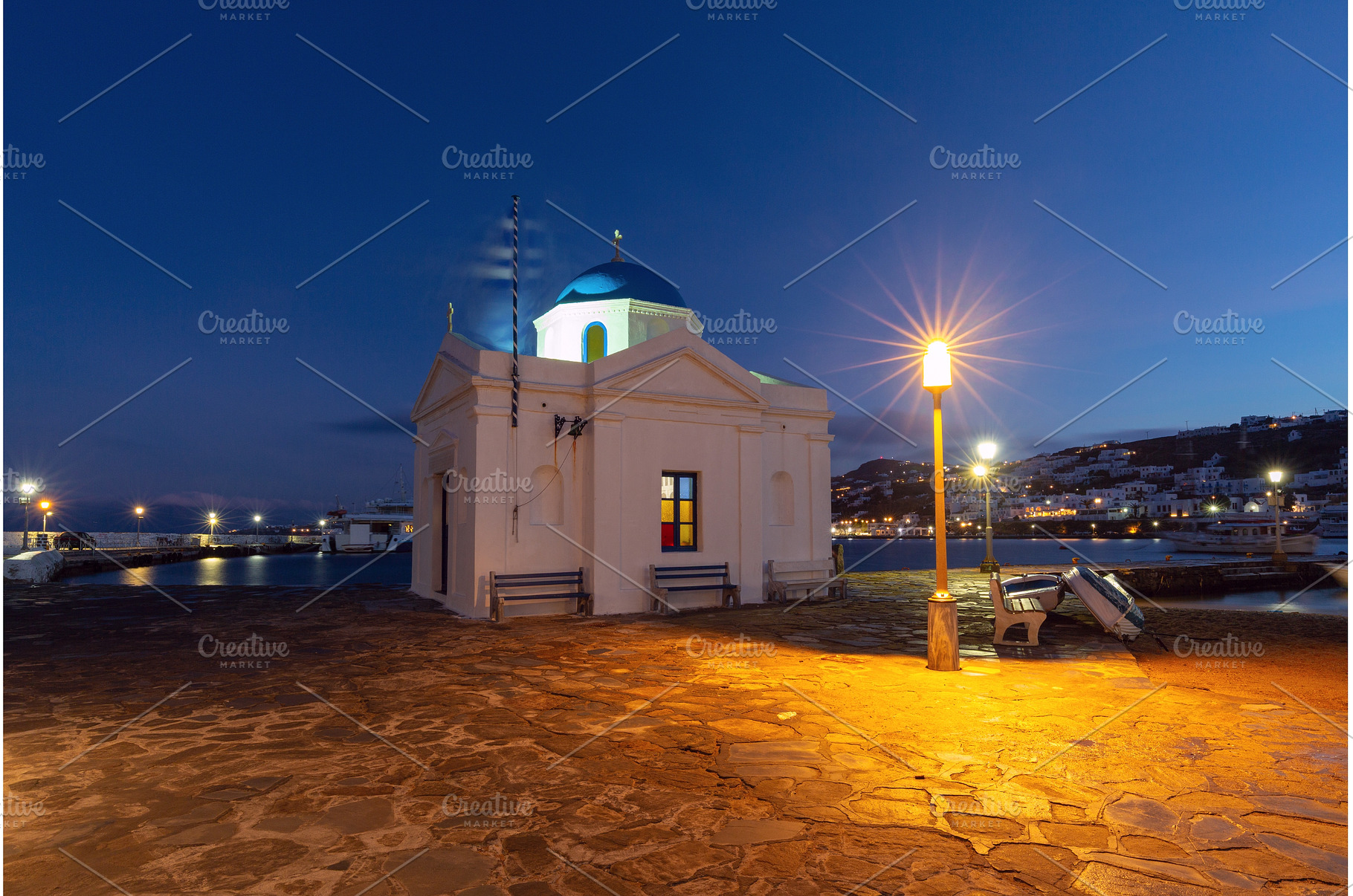Seaside church with blue dome in, an Architecture Photo by kavalenkava