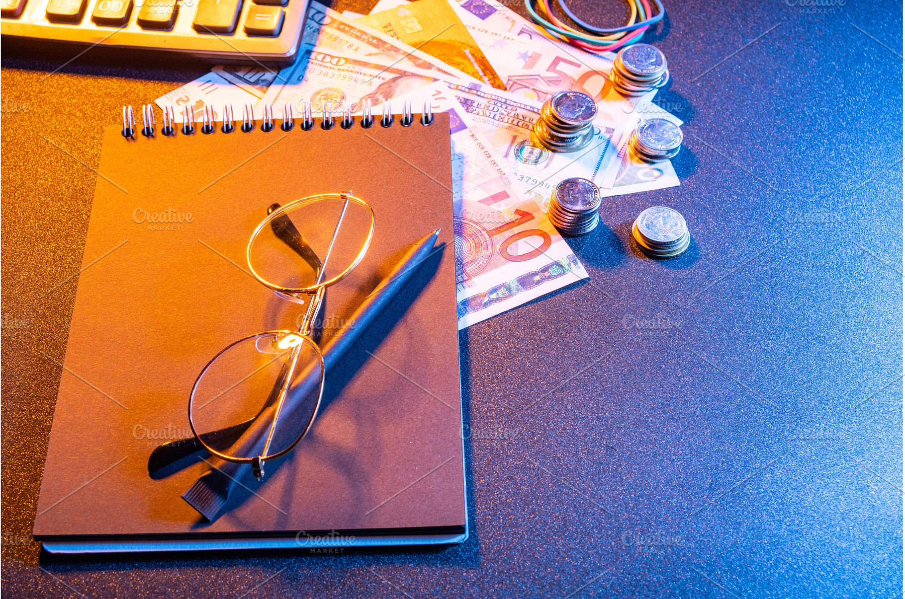 Angled view of black notebook on, a Business Photo by Stockphoto by vzwer
