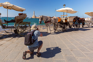 Horse carriages and photographer at