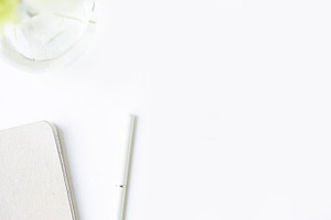 Desk stock photo containing notebook and pencil