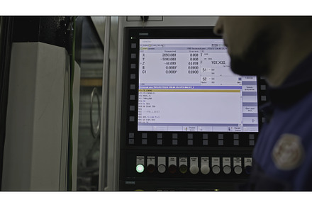 Worker with touch control panel for, an Industrial Photo by Media Whale Stock