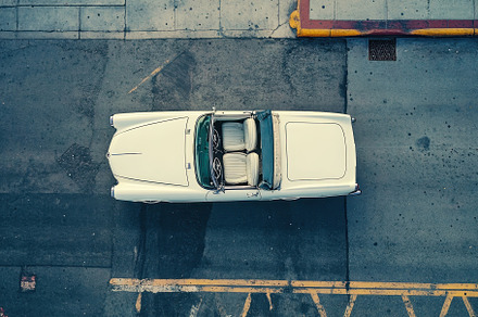 Vintage white convertible cruising t, a Photo by Iftikhar Alam