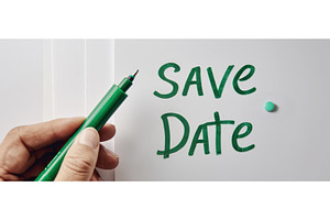 Handwriting save the date with green, a Business Photo by piter.goskov