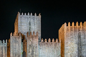 Guimaraes medieval castle exterior view, portugal, a Photo by DanFLCreativo