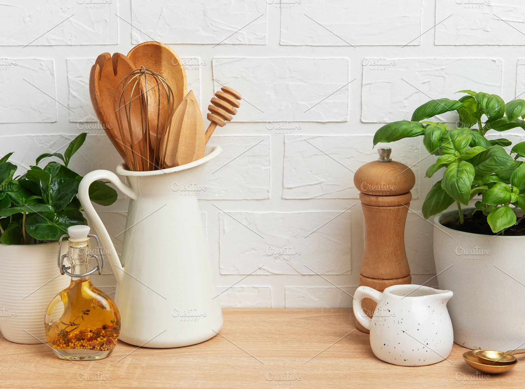 Kitchen utensils, plants and spices creating a cozy atmosphere o, a Food & Drink Photo by Olena Rudo