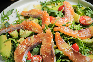 Salad with salted salmon and arugula, a Food & Drink Photo by Budarinphoto