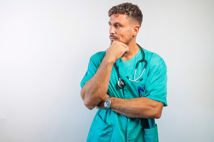 Doctor Thinking with Hand on Chin