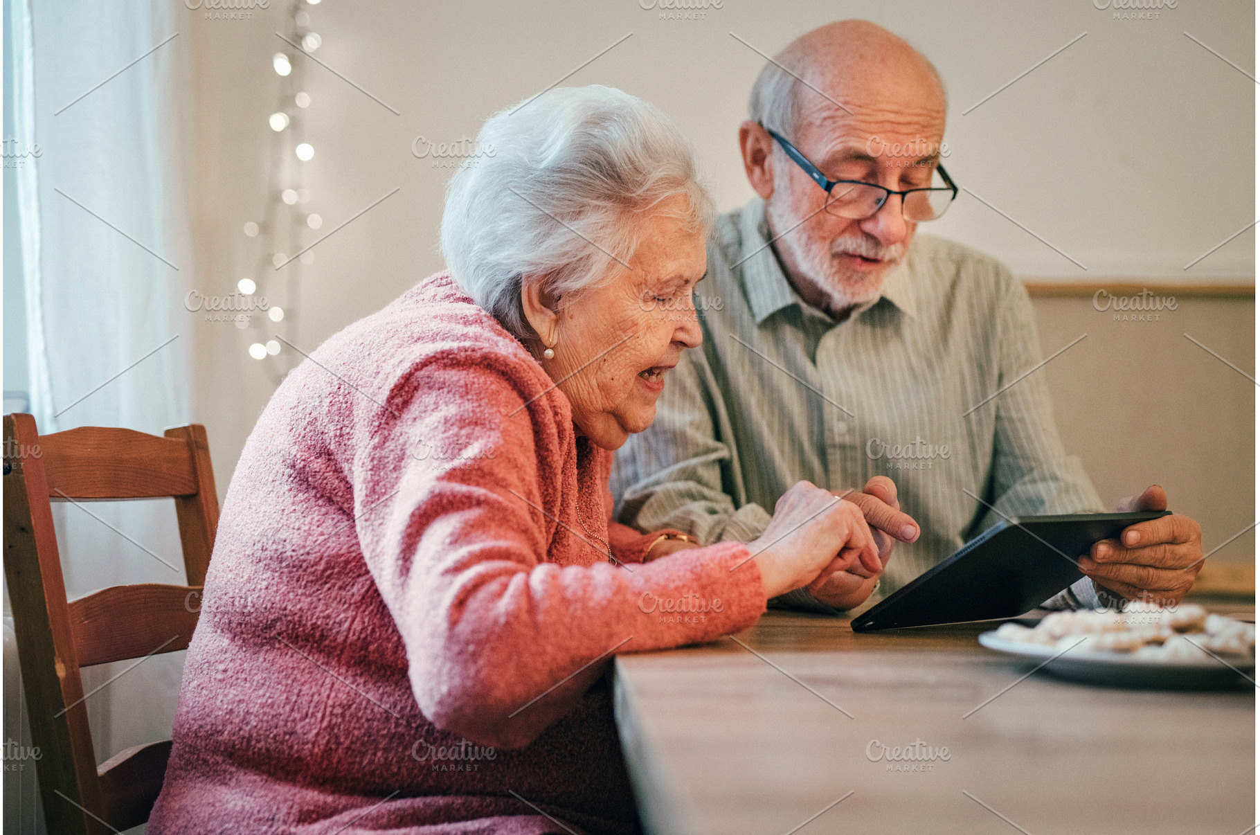 Senior man and woman making, a Technology Photo by HalfPoint