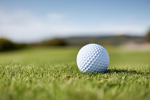 White golf ball on green grass with, a Sports & Recreation Photo by MistyDay