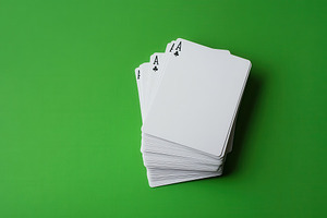 Green background with blank cards, a Photo by Pavel_design