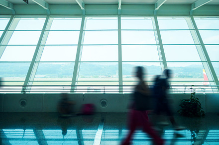 Passengers in airport terminal, an Architecture Photo by GoodGoods