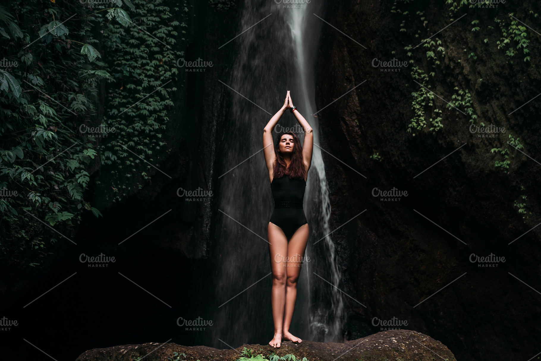 Young woman practicing yoga containing balance, bali, and bali indonesia, a Person Photo by SOTNIKOV_MISHA