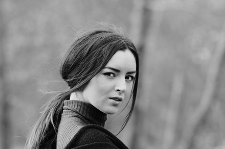 Woman in b&w featuring white, black, and woman