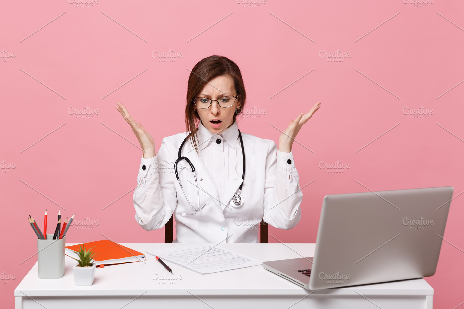 Tired sad female doctor sits at desk containing medic, office, and consultant, a Person Photo by ViDi Studio