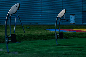 Outdoor gym equipment in a park setting, Akranes, Iceland, early evening, a Photo by AS photostudio