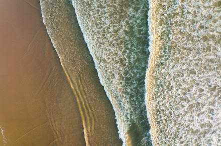 Aerial view of wide beach and waves, a Background Photo by Landscape and travel
