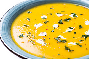 Creamy pumpkin soup with herbs and cream, a Food & Drink Photo by etorres69