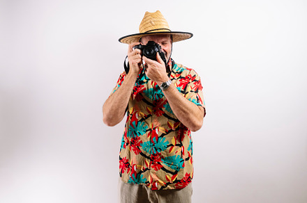 Smiling man ready for tropical vacation adventure
